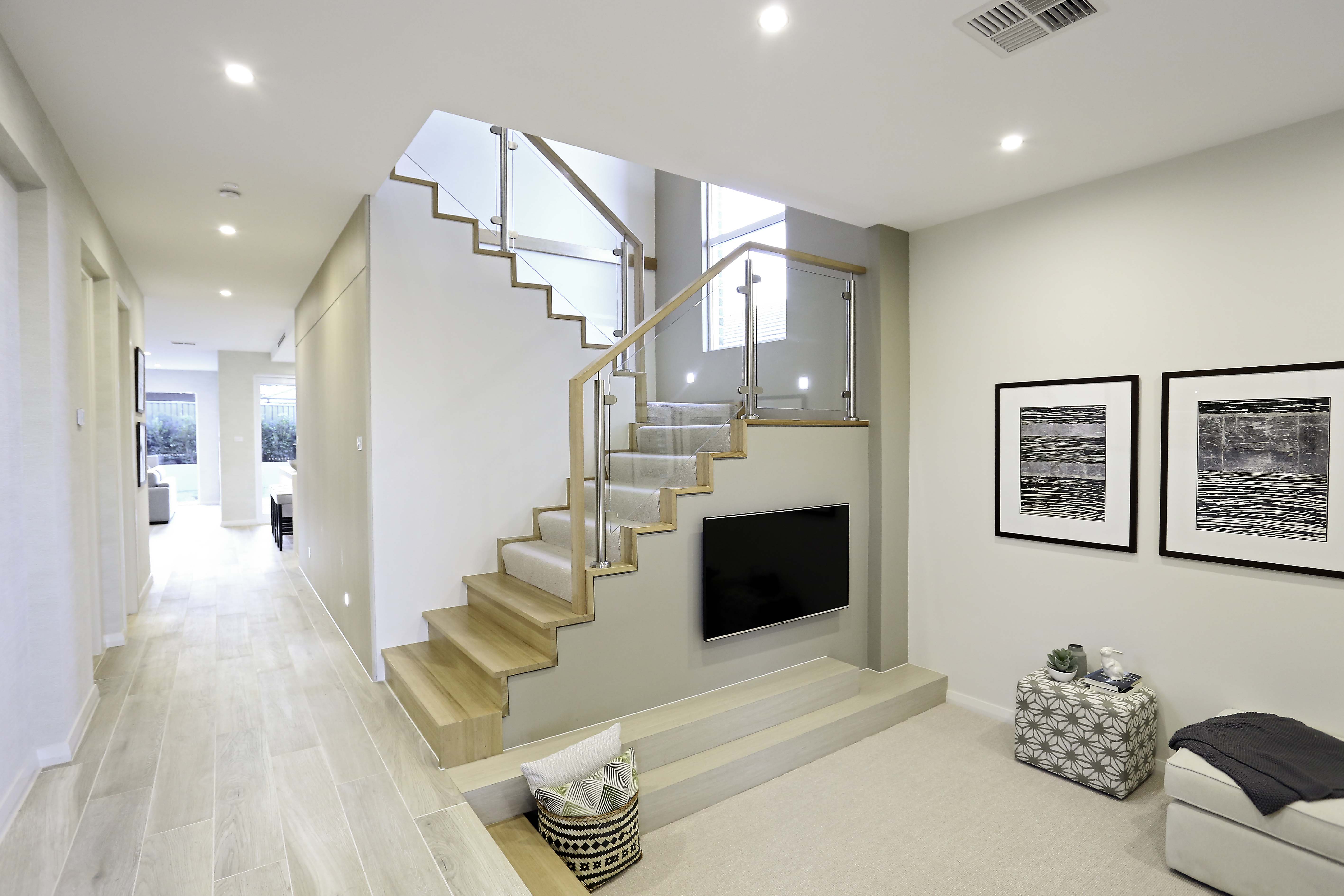Aspiration Contemporary Closed Rise Carpeted Staircase, Glass Balustrades with Timber Handrail
