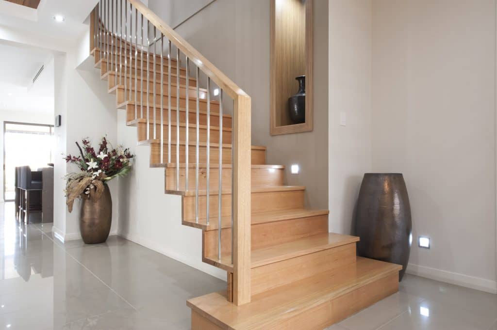 Manhattan Architectural Cantilevered Closed Rise Staircase, Stainless Steel Balustrade with Timber Handrail